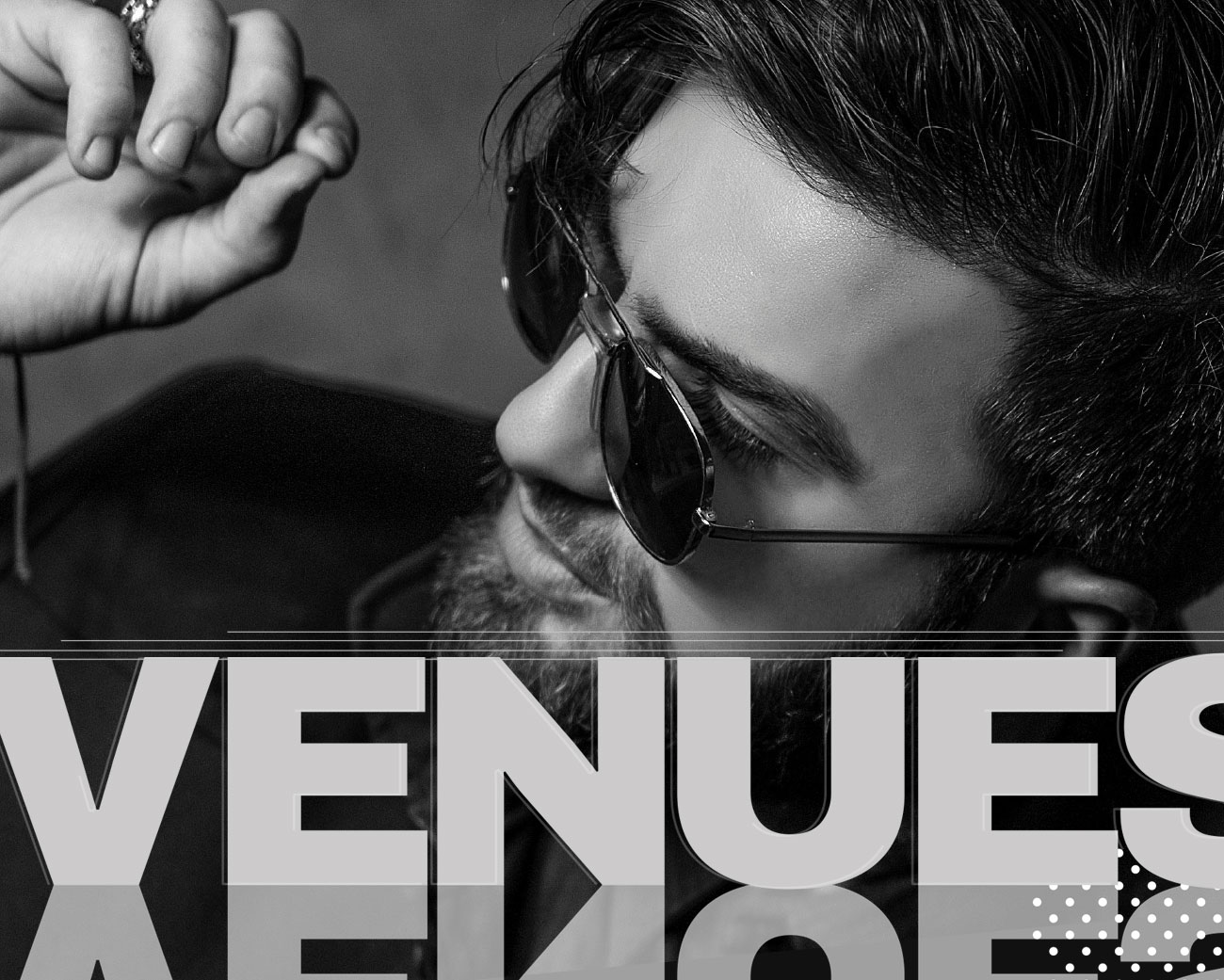 a clickable black and white image of a stylish man