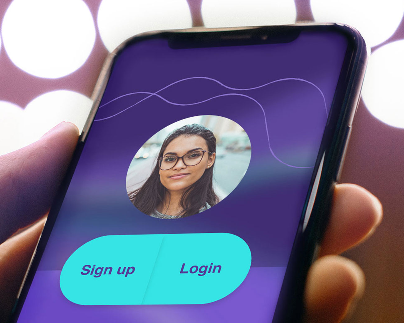 a clickable image of a hand holding a cellphone